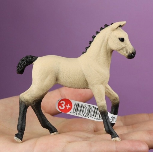 Фигурка Ганноверский буланый жеребенок Schleich 13929