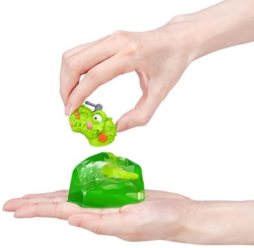 Игрушка сюрприз Smashers Mini Jurassic Lightup Dino зеленый